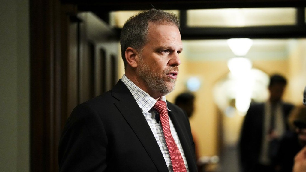 Health Minister Mark Holland arrives to a cabinet meeting on Parliament Hill in Ottawa on Tuesday, May 28, 2024. (Sean Kilpatrick/The Canadian Press)