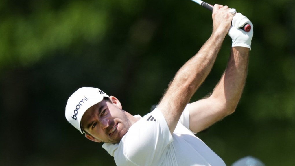Defending champion and Canadian Nick Taylor hits his tee shot on the ninth hole during the Canadian Open Pro-Am in Hamilton, Ont. (Nathan Denette/The Canadian Press)