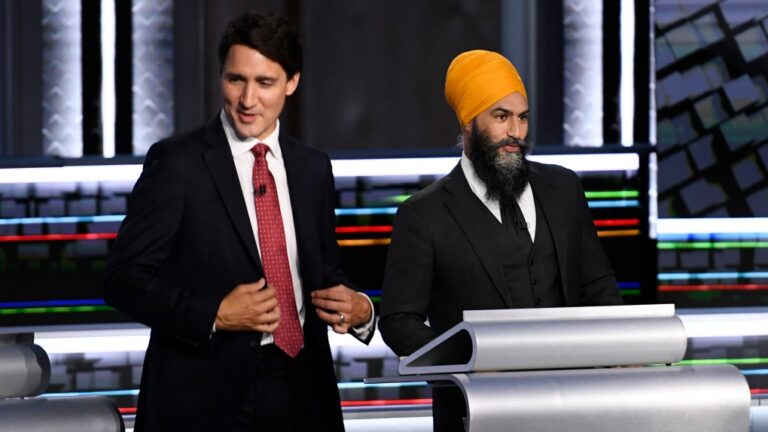 Liberal Leader Justin Trudeau, left, and NDP Leader Jagmeet Singh, prepare for the start of the federal election English-language Leaders debate in Gatineau, Que., on Thursday, Sept. 9, 2021. THE CANADIAN PRESS/Justin Tang