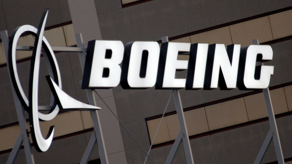 The Boeing logo is seen, Jan. 25, 2011, on the property in El Segundo, Calif. (AP Photo/Reed Saxon, File)
