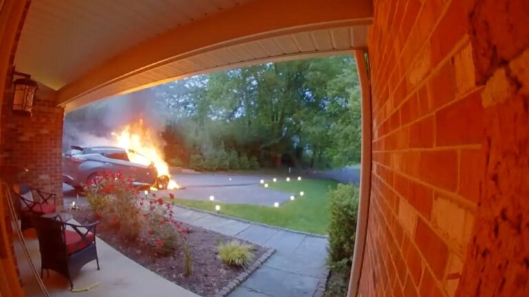 A Nissan SUV was parked in the driveway and then it caught fire and exploded. (Philip Hill via CNN Newsource)