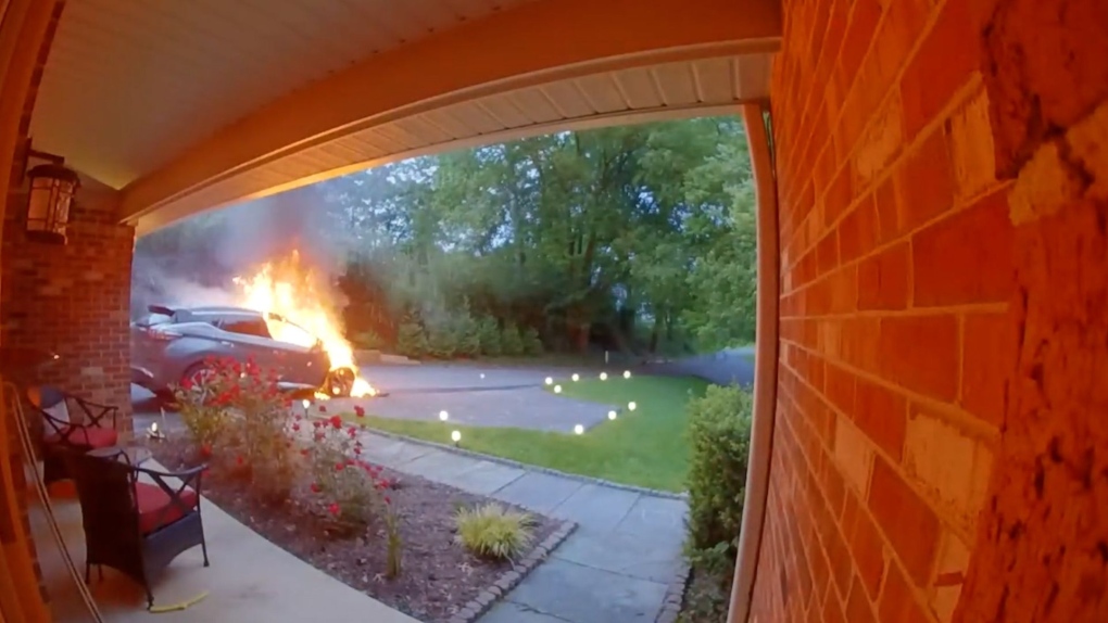 A Nissan SUV was parked in the driveway and then it caught fire and exploded. (Philip Hill via CNN Newsource)