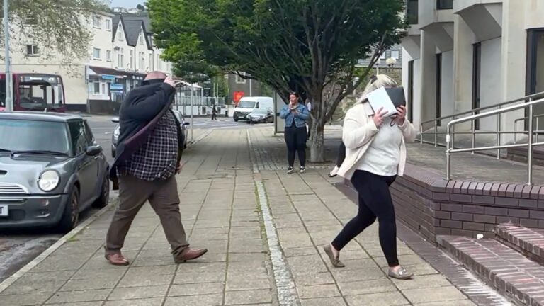 In this still image taken from video, Ann and Bernard McDonagh arrive at Swansea Crown Court in Wales, May 29, 2024. (Claire Hayhurst/PA via AP)