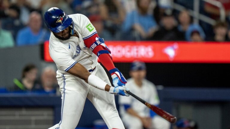 Toronto Blue Jays Vladimir Guerrero Jr. hits a three-run double during sixth inning American League MLB baseball action against the New York Yankees, in Toronto, Saturday, June 29, 2024. THE CANADIAN PRESS/Frank Gunn