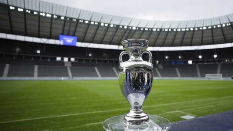 The trophy is on display during the presentation of the European soccer championship 'EURO 2024' trophy at the Olympic Stadium in Berlin, Germany, Wednesday, April 24, 2024. The Euros kick off in Munich, Friday June 14, when host country Germany plays Scotland at Bayern Munich's Allianz Arena. The tournament begins with six groups of four teams. (AP Photo/Markus Schreiber, File)