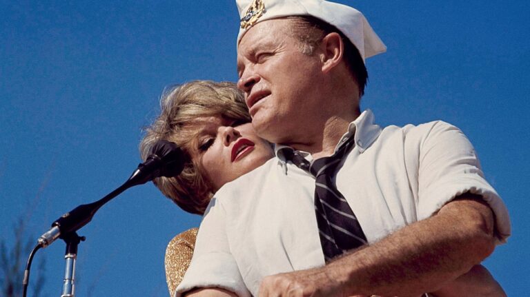 Bob Hope and Janis Paige hug during the annual Christmas show in Saigon, Vietnam, Dec. 25, 1964. (AP Photo, File)