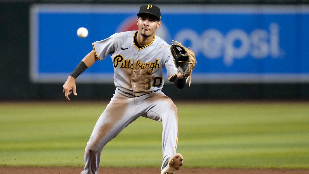 Former Pittsburgh Pirates shortstop Tucupita Marcano takes a throw down to second base during the fifth inning of a baseball game against the Arizona Diamondbacks, July 7, 2023, in Phoenix. (AP Photo/Ross D. Franklin, File)