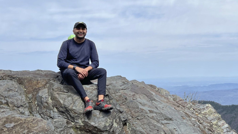 Prince Bhojwani sits on Charlies Bunion mountain along the Appalachian Trail in Great Smoky Mountains National Park in Tennessee on April 17, 2022. (Nita Bhojwani via AP)