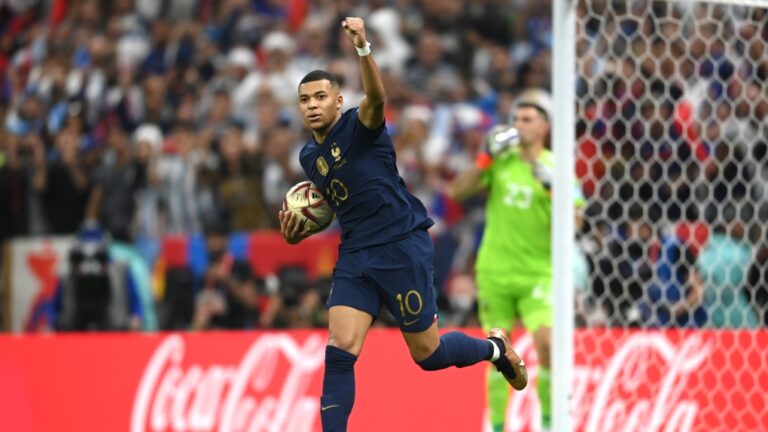 Kylian Mbappe of France celebrates after scoring the team's first goal during the FIFA World Cup Qatar 2022 Final match between Argentina and France at Lusail Stadium on December 18, 2022 in Lusail City, Qatar. (Photo by Michael Regan - FIFA/FIFA via Getty Images)