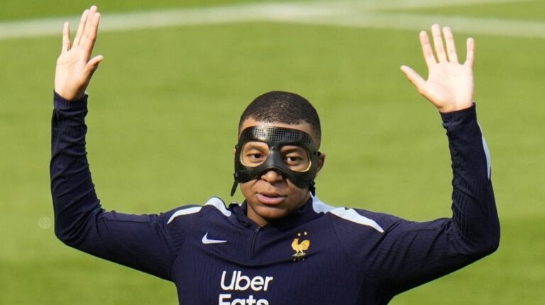 France's Kylian Mbappe gestures during a training session in Paderborn, Germany, Sunday, June 23, 2024.