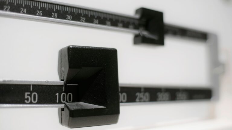 This Tuesday, April 3, 2018 file photo shows a closeup of a beam scale. (Patrick Sison / AP Photo, File)