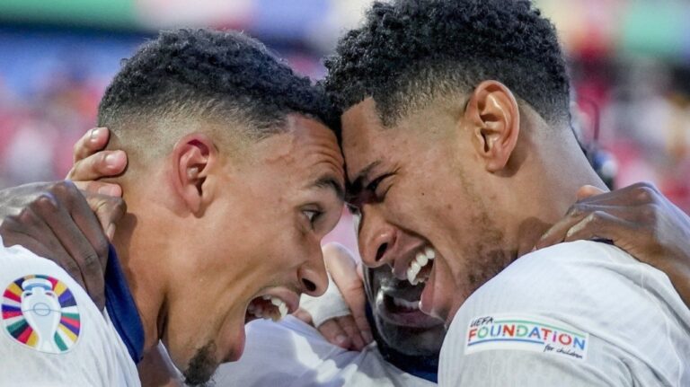 England's Jude Bellingham, right, and England's Trent Alexander-Arnold celebrate after a quarterfinal match between England and Switzerland at the Euro 2024 soccer tournament in Duesseldorf, Germany, Saturday, July 6, 2024. (AP Photo/Darko Vojinovic)