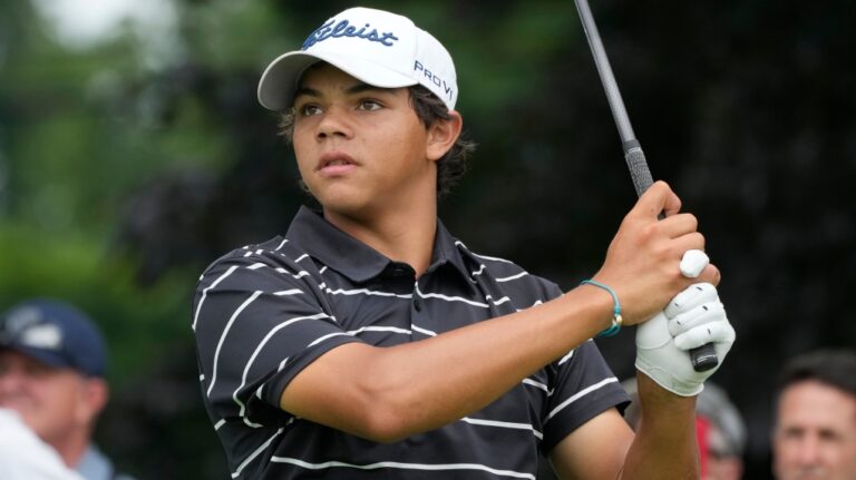 Charlie Woods drives off the 18th tee during the first round of stroke play of the U.S. Junior Amateur Golf Championship, Monday, July 22, 2024, in Bloomfield Township, Mich. (Carlos Osorio / AP Photo)