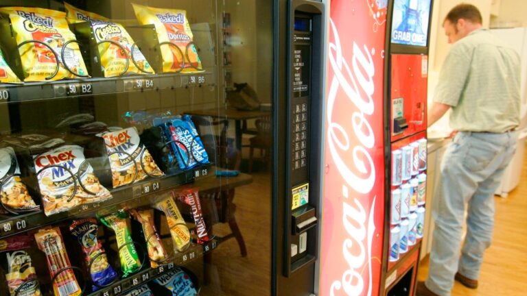 A student stands near vending machines at the University of Arkansas Clinton School for Public Service in Little Rock, Ark., Wednesday, May 3, 2006. (AP Photo/Danny Johnston)