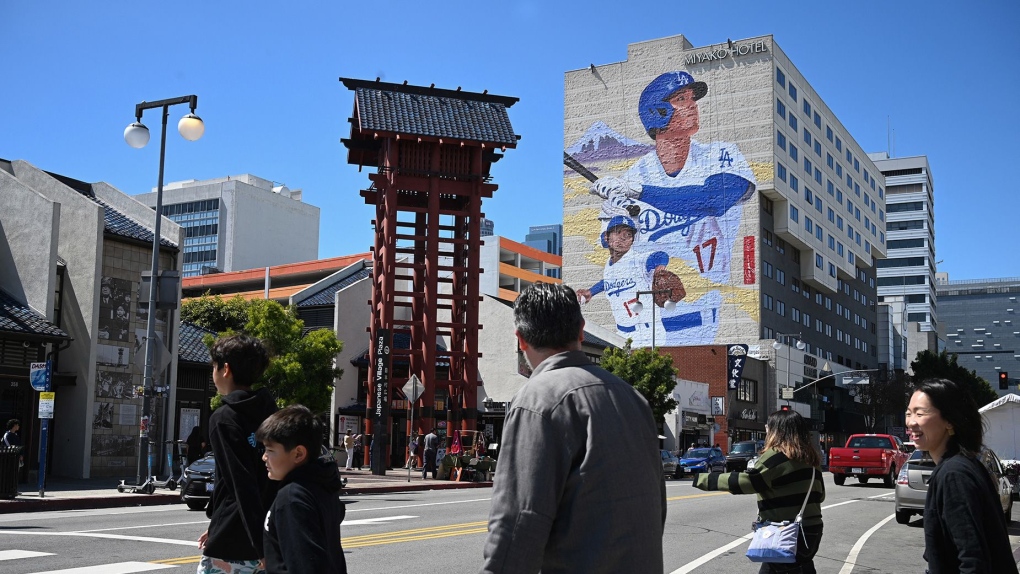 A mural showing Los Angeles Dodgers player Shohei Ohtani is painted on the side of the Miyako Hotel in Little Tokyo in downtown Los Angeles. (Robyn Beck/AFP/Getty Images via CNN Newsource)