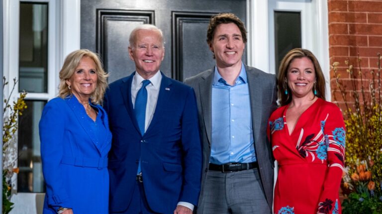 President Joe Biden and first lady Jill Biden pose for members of the media as they arrive to visit with Canadian Prime Minister Justin Trudeau and his wife Sophie Gregoire Trudeau at Rideau Cottage, Thursday, March 23, 2023, in Ottawa, Canada. (AP Photo/Andrew Harnik)