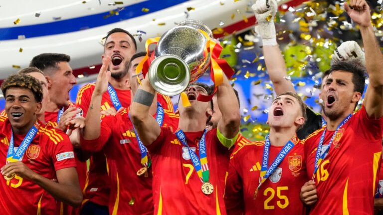 Spain's Alvaro Morata lifts the trophy after winning the final match between Spain and England at the Euro 2024 soccer tournament in Berlin, Germany, Sunday, July 14, 2024. Spain won 2-1. (Manu Fernandez / AP Photo)
