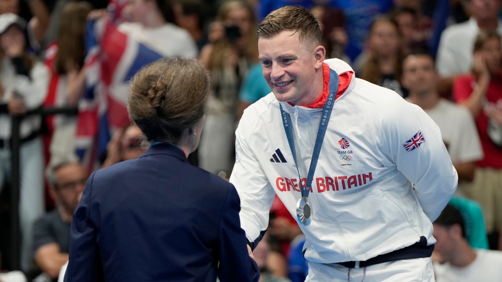 Princess Anne, left, congratulates Adam Peaty, of Britain, after winning the silver medal in the men's 100-meter breaststroke final at the 2024 Summer Olympics, Sunday, July 28, 2024, in Nanterre, France. (Matthias Schrader / AP Photo)