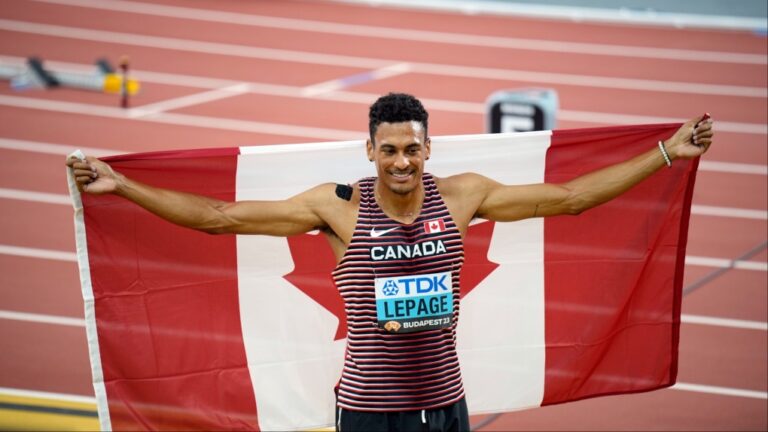 Pierce Lepage, of Canada celebrates after competing in the decathlon 1500-metres during the World Athletics Championships in Budapest, Hungary, Saturday, Aug. 26, 2023. (AP Photo/Martin Meissner)