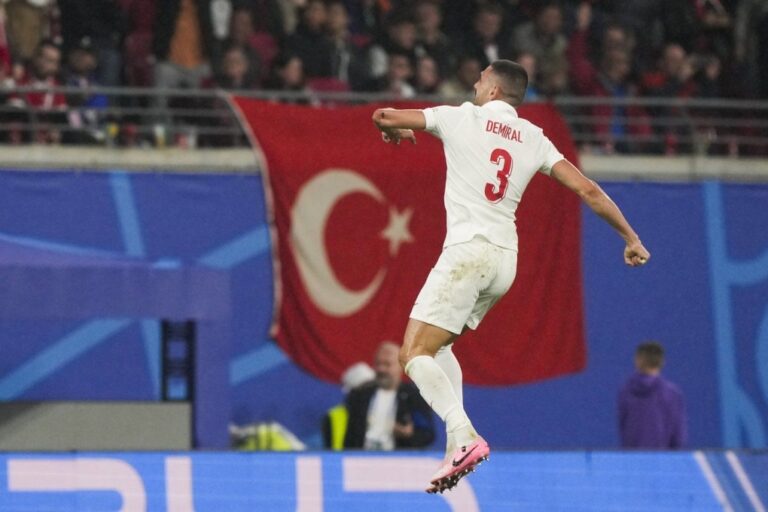 Turkey's Merih Demiral celebrates after scoring his side's second goal during a round of sixteen match between Austria and Turkey at the Euro 2024 soccer tournament in Leipzig, Germany, Tuesday, July 2, 2024. (AP Photo/Martin Meissner)
