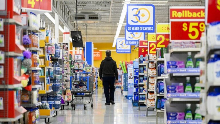 People shop at a Walmart in Vaughan, Ont., during sensory hours, which are select hours that accommodate people who want a quieter shopping experience, on Wednesday, July 2, 2024. THE CANADIAN PRESS/Christopher Katsarov