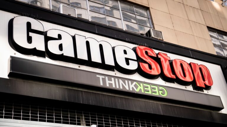 Pedestrians pass a GameStop store on 14th Street at Union Square, Thursday, Jan. 28, 2021, in the Manhattan, New York. (John Minchillo / AP Photo, File)