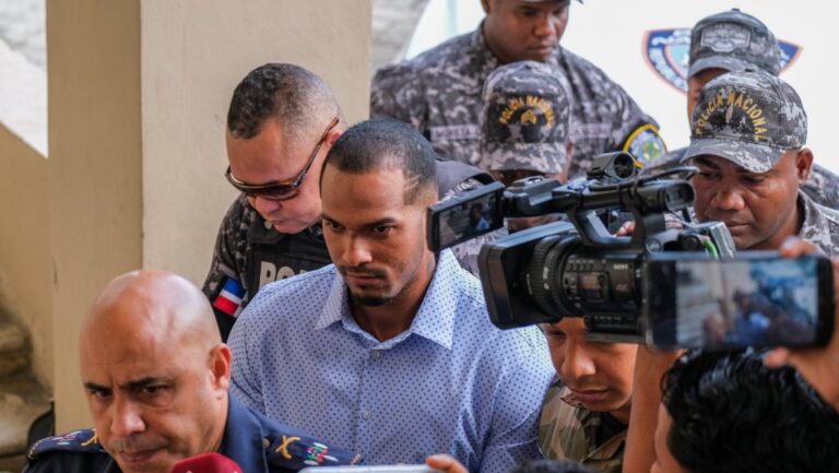 FILE - Tampa Bay Rays shortstop Wander Franco, centre, is escorted by police to court in Puerto Plata, Dominican Republic, Jan. 5, 2024. Dominican prosecutors formally accused Franco on Tuesday, July 9, 2024, of sexual abuse against a 14-year-old girl. (AP Photo/Ricardo Hernandez, File)