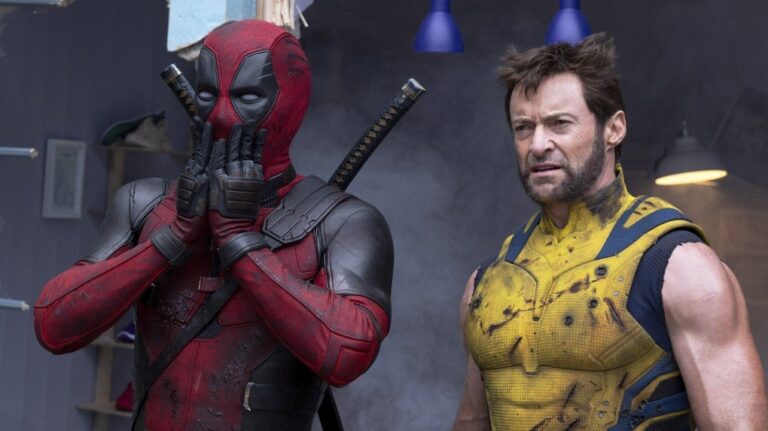 This image released by 20th Century Studios/Marvel Studios shows Ryan Reynolds as Deadpool/Wade Wilson, left, and Hugh Jackman as Wolverine/Logan in a scene from 'Deadpool & Wolverine.' (20th Century Studios)
