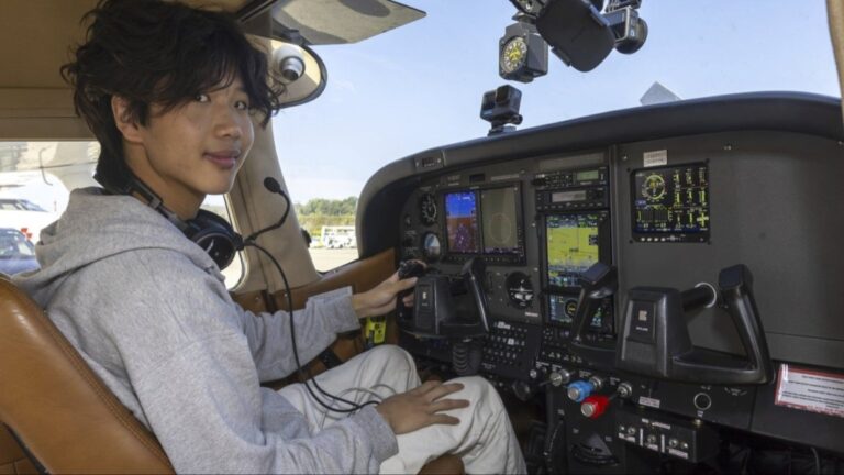 American pilot Ethan Guo poses for the photographer in Geneva, Switzerland, Tuesday, August 6, 2024 before his take off from Geneva Airport for attempting world record solo flight all seven Continents. (Salvatore Di Nolfi/Keystone via AP)
