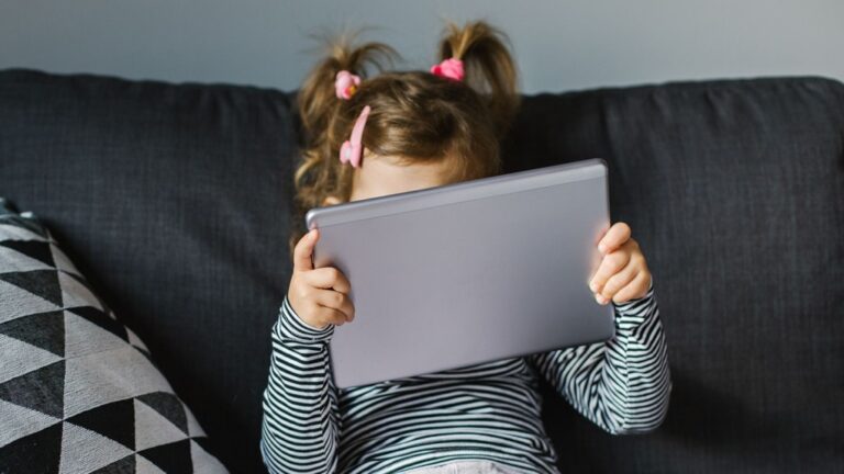 When parents, teachers and caregivers offer kids technology to soothe them, the children miss an opportunity to manage their negative emotions themselves. (CokaPoka/iStockphoto/Getty Images via CNN Newsource)