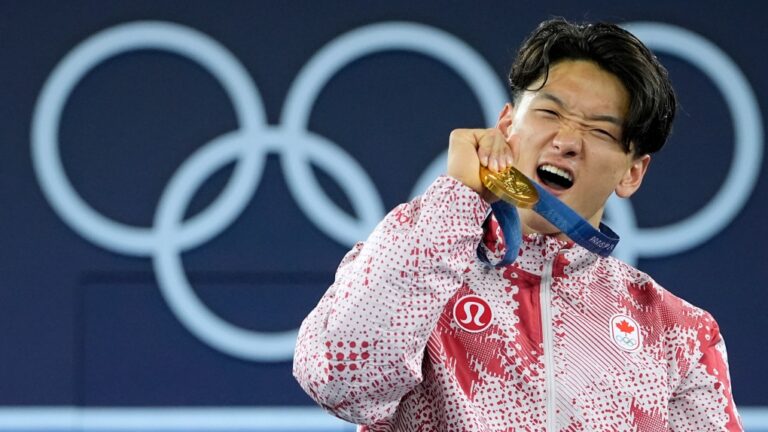 Gold medallist Canada's Philip Kim, known as B-Boy Phil Wizard, poses with his medal after the B-Boys finals in the breaking competition at La Concorde Urban Park at the 2024 Summer Olympics, Saturday, Aug. 10, 2024, in Paris, France. (AP Photo/Frank Franklin II)