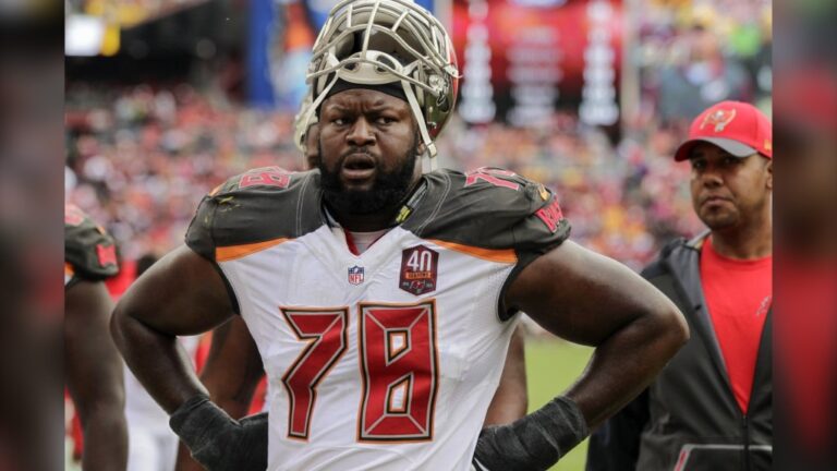 Tampa Bay Buccaneers tackle Gosder Cherilus (78) walks of the field at halftime during the first half of an NFL football game against the Washington Redskins in Landover, Md., Oct. 25, 2015. (AP Photo/Mark Tenally)