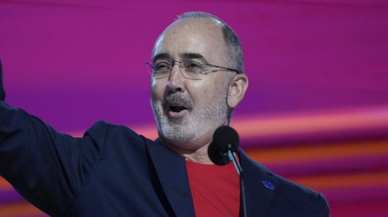 Shawn Fain, president of the United Automobile Workers, speaks during the Democratic National Convention Monday, Aug. 19, 2024, in Chicago. (Paul Sancya/AP Photo)