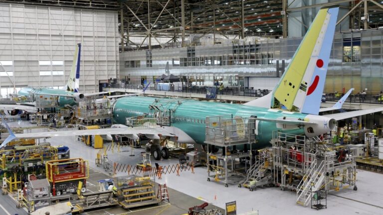 A Boeing 737 MAX aircraft is shown on the assembly line at the Boeing facility in Renton, Wash., June 25, 2024.  (Jennifer Buchanan/The Seattle Times via AP, Pool, File)