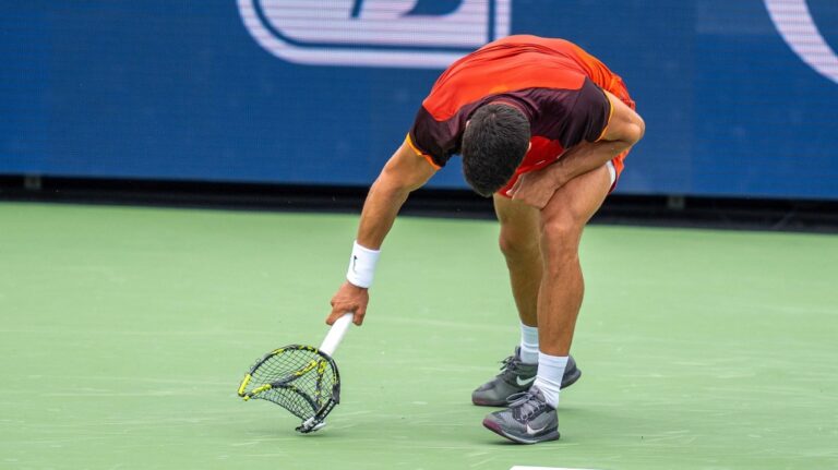 Carlos Alcaraz smashed his racket during the match. (Susan Mullane/USA Today Sports/Reuters via CNN Newsource)