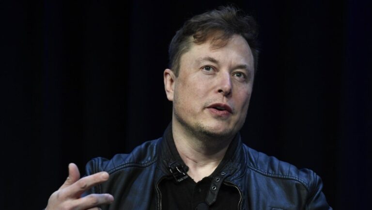 FILE - Tesla and SpaceX CEO Elon Musk speaks at the SATELLITE Conference and Exhibition in Washington, March 9, 2020. The British government on Tuesday, Aug. 6, 2024, has called on Musk to act responsibly after one of the world’s richest men used his social media platform to unleash a barrage of posts that risked inflaming the violent unrest gripping the country. (AP Photo/Susan Walsh, File)