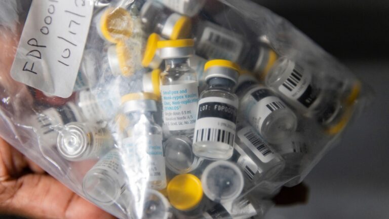 Vials of single doses of the Jynneos vaccine for mpox are seen from a cooler at a vaccinations site on Aug. 29, 2022. (Jeenah Moon / The Associated Press)