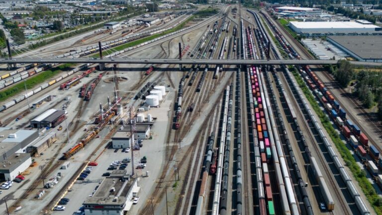 Trains are seen in an aerial view of the Canadian Pacific Kansas City rail yard in Port Coquitlam, B.C., Aug. 19, 2024. THE CANADIAN PRESS/Darryl Dyck
