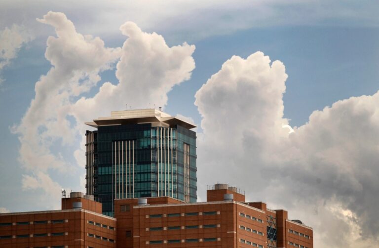Clouds form over downtown Fort Worth, Texas, Thursday, Aug. 11, 2011, as rainy weather tries to move into the area for the first time in weeks. (AP Photo/Star-Telegram, Rodger Mallison)