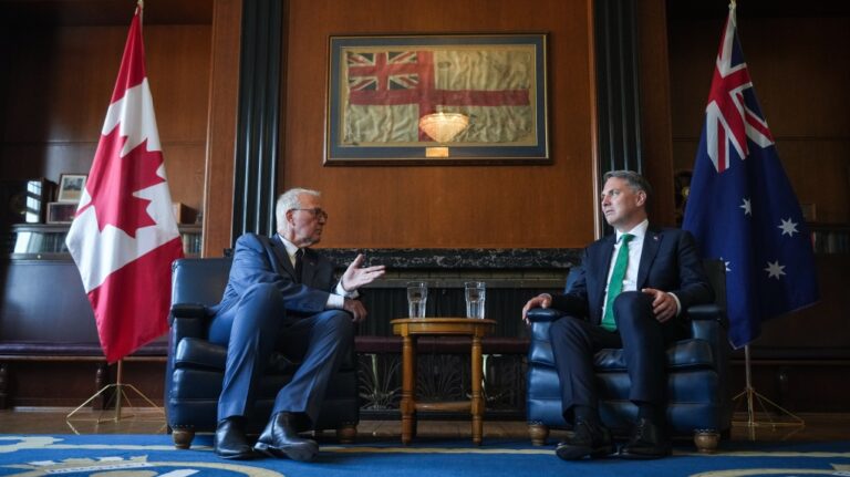 Canada's Minister of National Defence Bill Blair, left, and Australia's Deputy Prime Minister and Minister for Defence Richard Marles hold a meeting at HMCS Discovery, a Royal Canadian Navy Reserve division, in Vancouver, on Thursday, August 8, 2024.(Darryl Dyck / The Canadian Press)