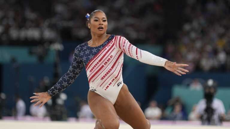 Jordan Chiles, of the United States, performs on the floor during the women's artistic gymnastics team finals round at Bercy Arena at the 2024 Summer Olympics, Tuesday, July 30, 2024, in Paris, France. (AP Photo/Charlie Riedel)