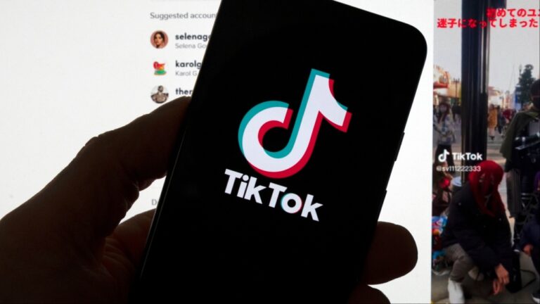 The TikTok logo is seen on a mobile phone in front of a computer screen which displays the TikTok home screen, Saturday, March 18, 2023, in Boston. (AP Photo/Michael Dwyer, File)