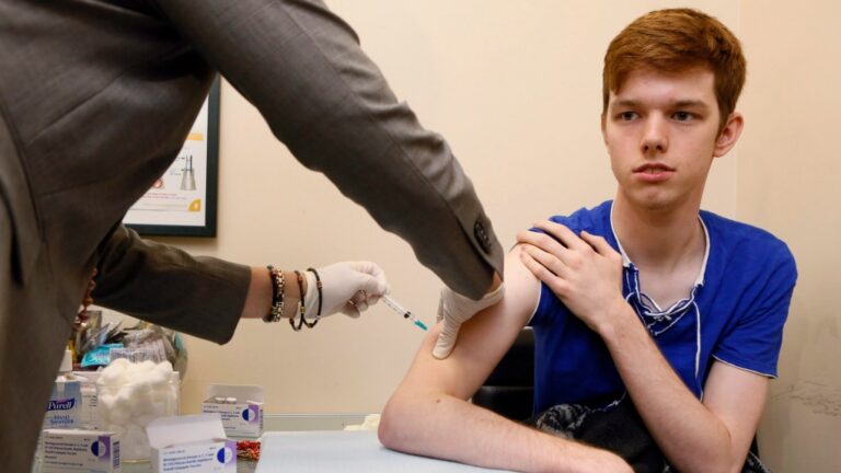 In this file photo, Allen Smith gets a free vaccine against bacterial meningitis in West Hollywood, Calif., Monday, April 15, 2013. (Damian Dovarganes/AP Photo)
