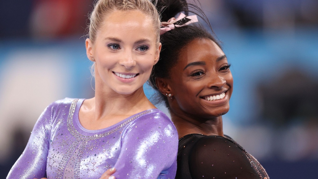 MyKayla Skinner (left) and Simone Biles (right) pictured at the Tokyo 2020 Olympic Games. (Patrick Smith / Getty Images / File via CNN Newsource)