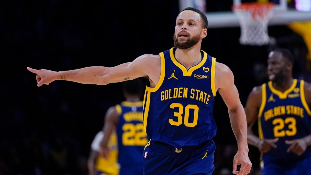 Golden State Warriors guard Stephen Curry gestures after making a three-point basket during the second half of the team's NBA basketball game against the Los Angeles Lakers, April 9, 2024, in Los Angeles. (AP Photo/Ryan Sun)