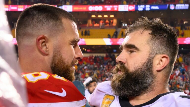 Kansas City Chiefs tight end Travis Kelce, left, meets with his brother, Philadelphia Eagles center Jason Kelce, right, after the Eagles defeated the Chiefs in an NFL football game, Monday, Nov. 20, 2023 in Kansas City, Mo. (Reed Hoffmann/AP Photo)