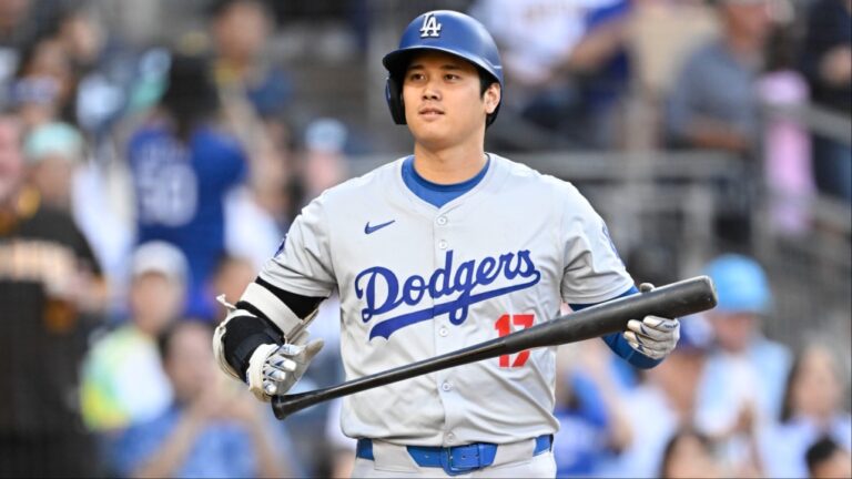 Los Angeles Dodgers designated hitter Shohei Ohtani (17) comes up to bat during the first inning of a baseball game against the San Diego Padres, Tuesday, July 30, 2024, in San Diego. (AP Photo/Denis Poroy)