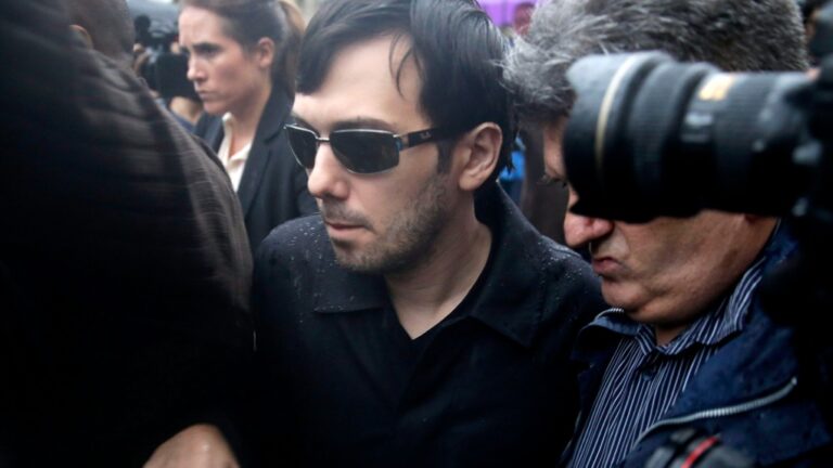 Martin Shkreli leaves the courthouse after his arraignment in New York, Dec. 17, 2015. (AP Photo/Seth Wenig)