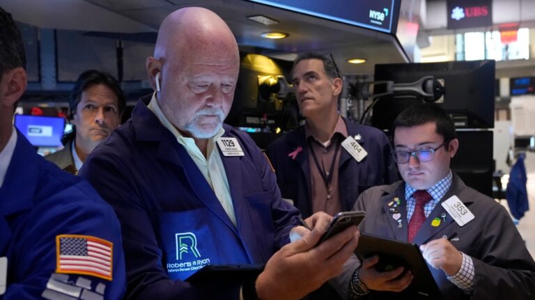 Traders work on the floor of the New York Stock Exchange on Aug. 16, 2024. (Richard Drew / AP Photo)