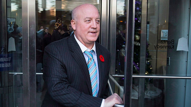 National Hockey League deputy commissioner Bill Daly leaves an NHL general manager's meeting in Toronto, Tuesday, Nov. 12, 2013. (Mark Blinch / THE CANADIAN PRESS)